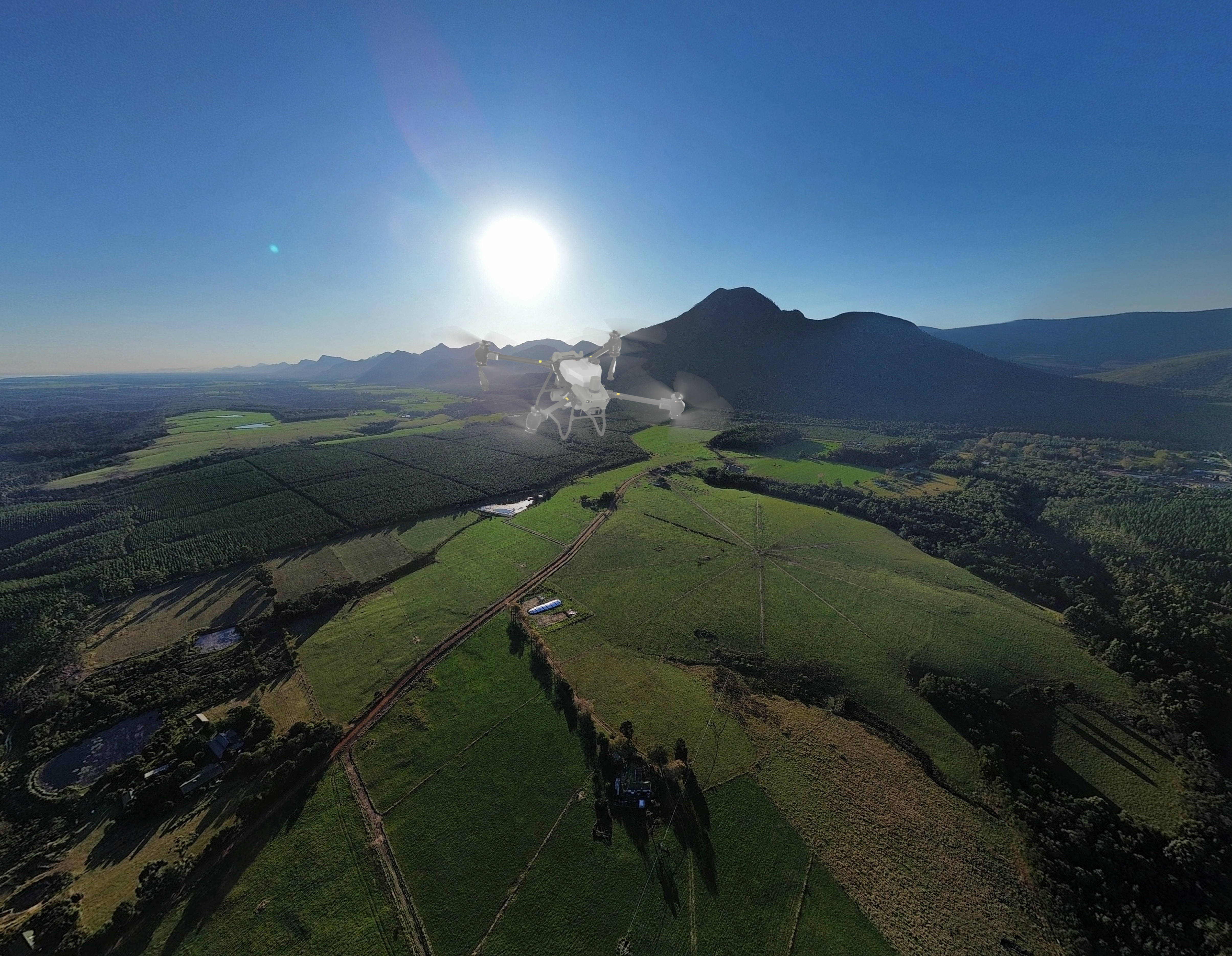 Drone spraying agricultural field